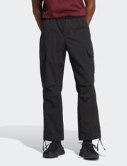 adidas Originals - P ESS CARGO - cargo pants - black - 2