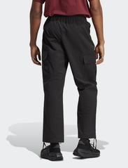 adidas Originals - P ESS CARGO - cargo pants - black - 3
