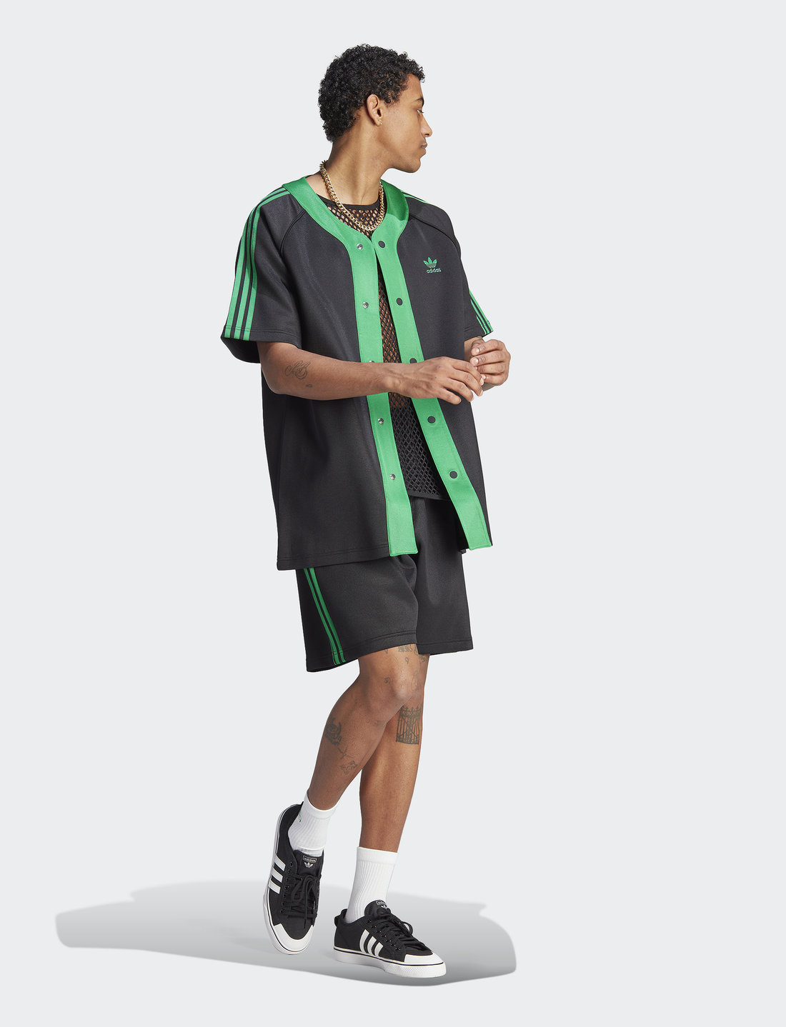Black and top green adidas shorts