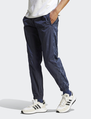 adidas Originals - ADV FLORAL PNT - spodnie sportowe - legink - 4