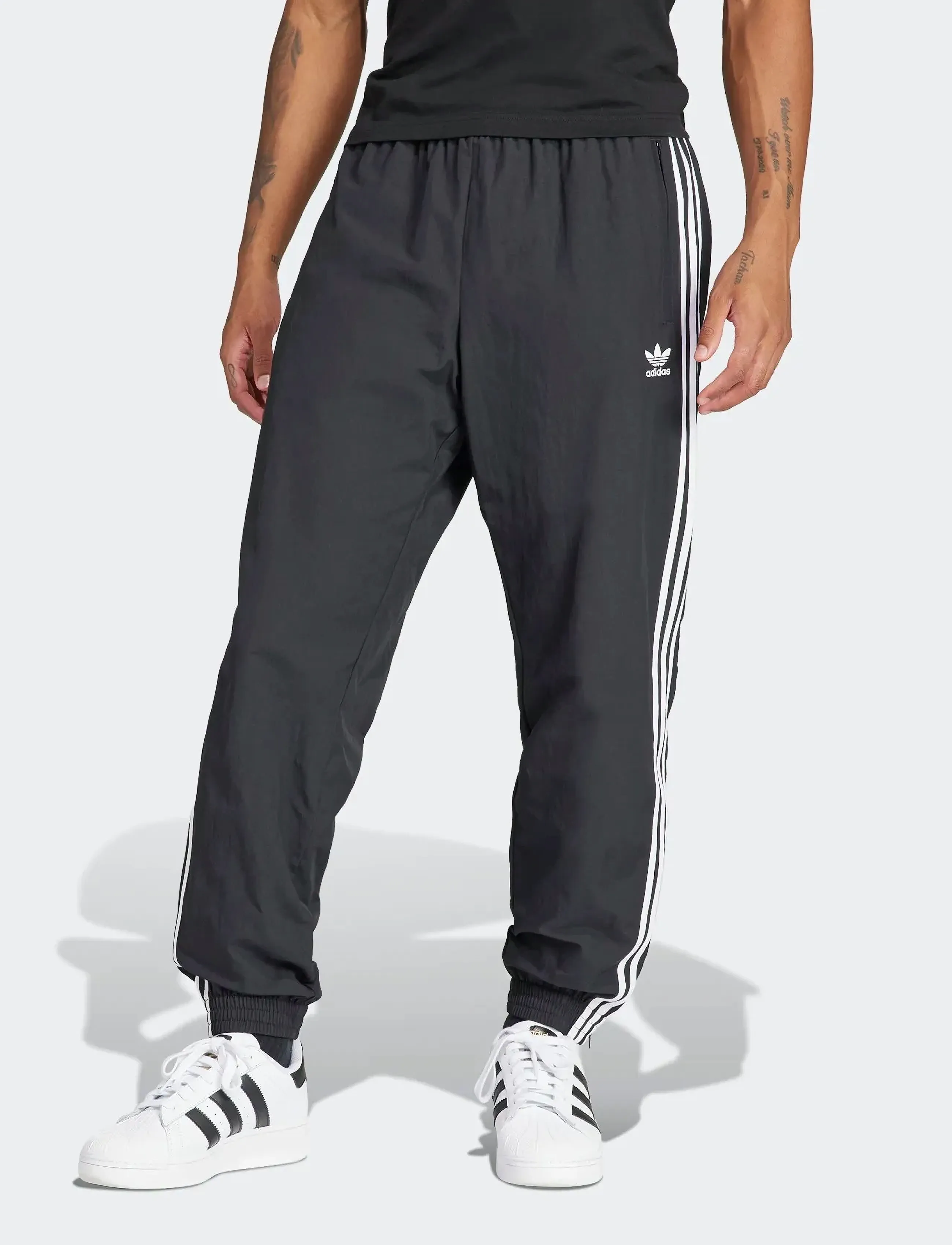 adidas Originals FIREBIRD PANTS - Sweatpants - BLACK / black