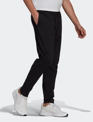 adidas Sportswear - Essentials Tapered Pants - black - 2