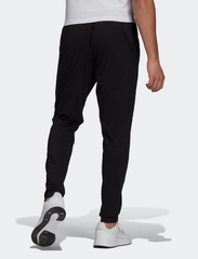 adidas Sportswear - Essentials Tapered Pants - black - 3