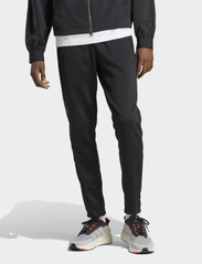 adidas Sportswear - M TIRO TP + - verryttelyhousut - black/black - 4