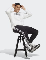 adidas Sportswear - ESSENTIALS SINGLE JERSEY TAPERED OPEN HEM 3-STRIPES PANTS - treningsbukser - black/white - 6