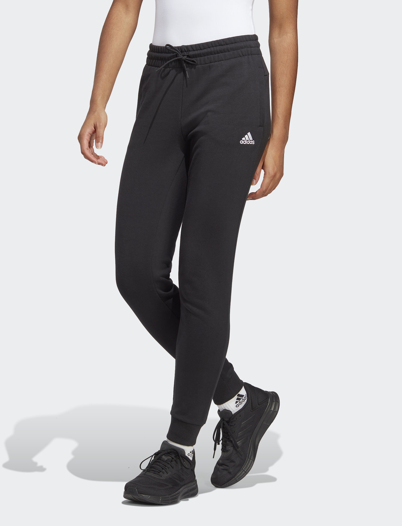 adidas Sportswear - ESSENTIALS LINEAR FRENCH TERRY CUFFED PANT - byxor - black/white - 0