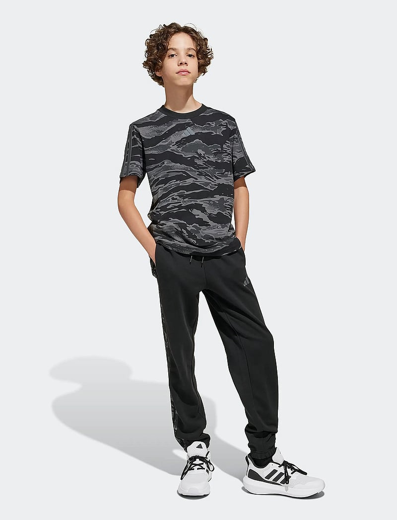 adidas Sportswear - J CAMO FT PT - trainingshosen - black/multco - 0