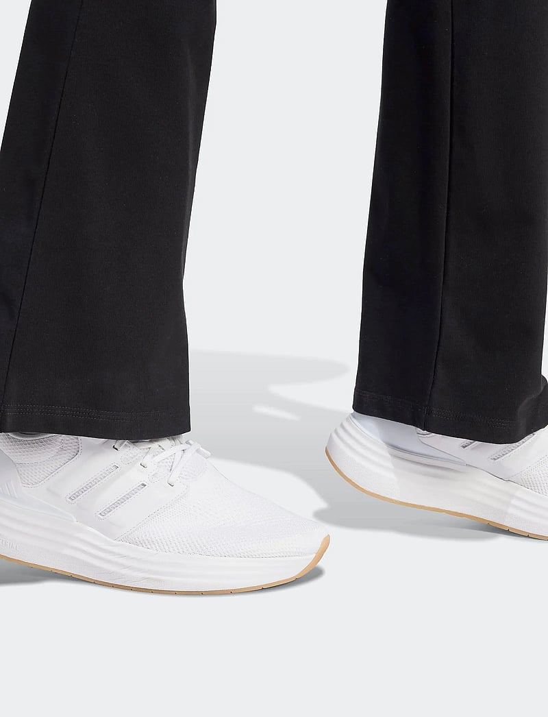 adidas Sportswear - W SL SJ FLARLEG - tights - black/white - 5