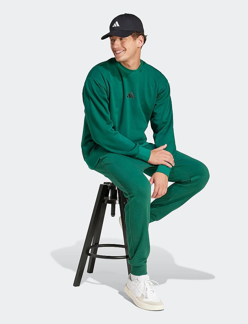 adidas Sportswear - M FEELCOZY SWT - oberteile - cgreen/black - 0