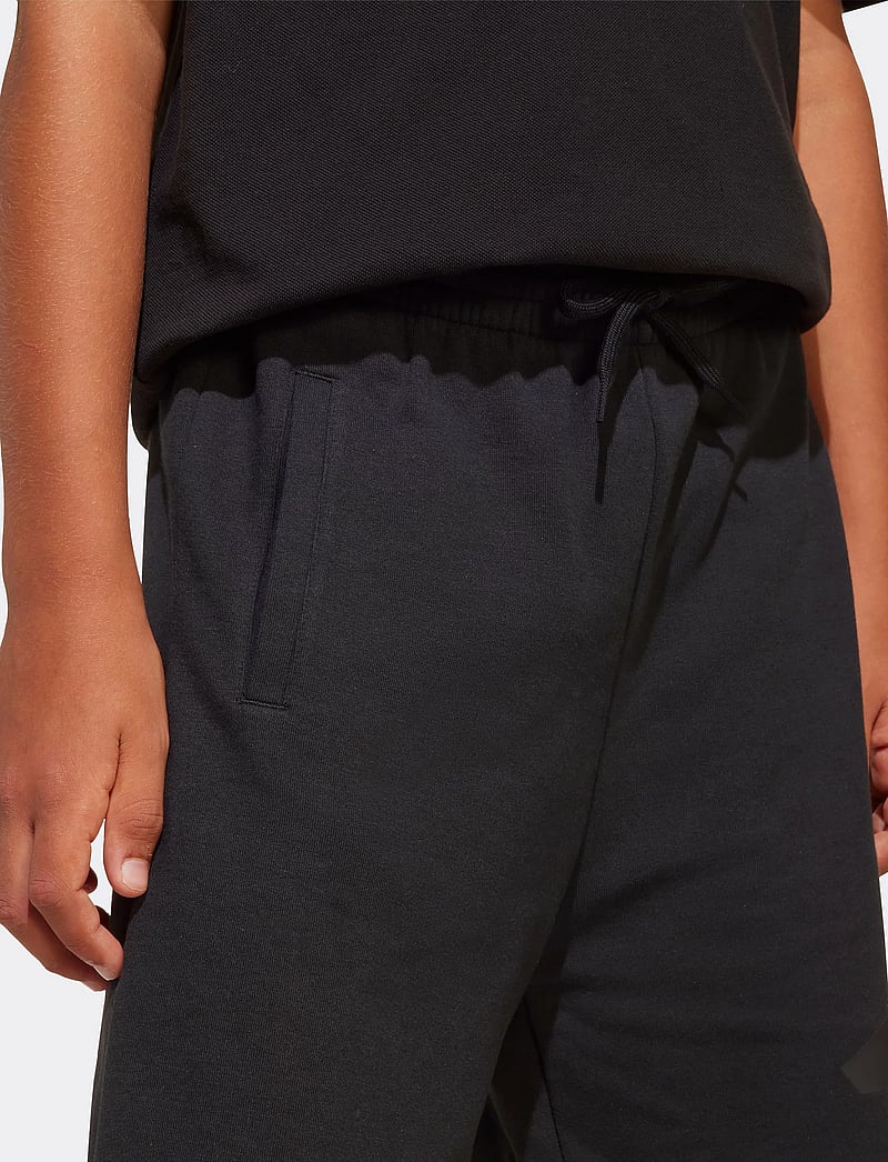 adidas Sportswear - J FI LOGO SHORT - sporta šorti - black/black - 3