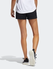 adidas Performance - PACER 3S WVN - trening shorts - black/white - 5
