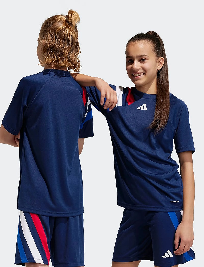 adidas Performance - FORTORE23 JSY Y - sporta topi - tenabl/tmcord/white/r - 0