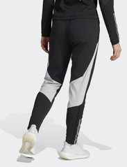 adidas Performance - TIRO23 C WINPTW - sportinės kelnės - black/tmlggr - 3