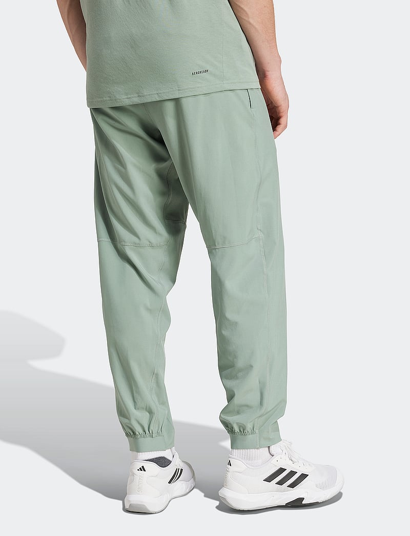 adidas Performance - TR-ES WOVEN PT - spordipüksid - silgrn/white - 2