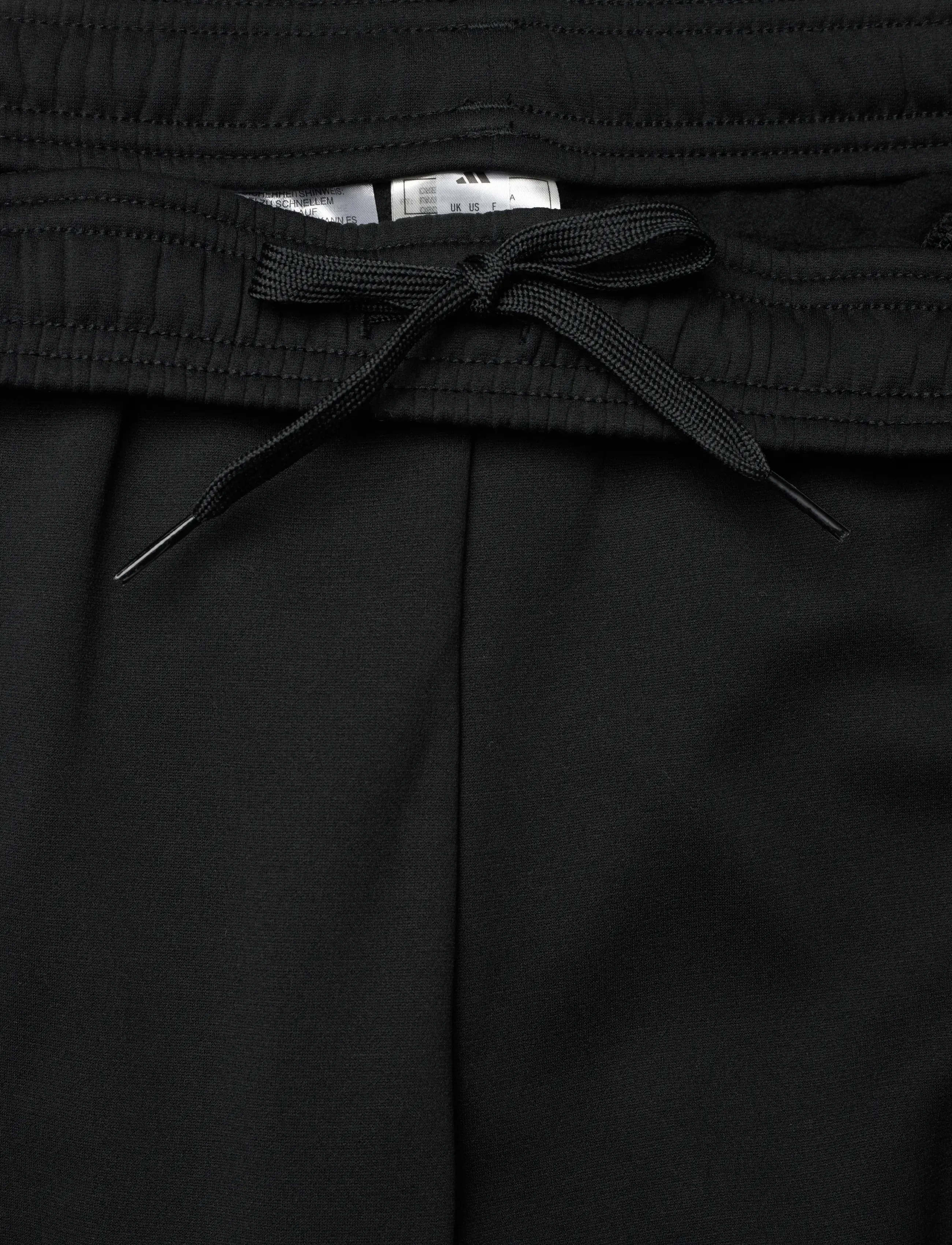 adidas Performance - TIRO25C WINPTW - casual trousers - black/tmdrgr - 5