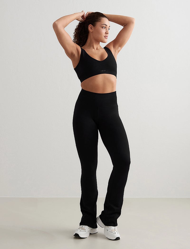 aim´n - Shape Seamless Flare Tights - seamless tights - black - 0