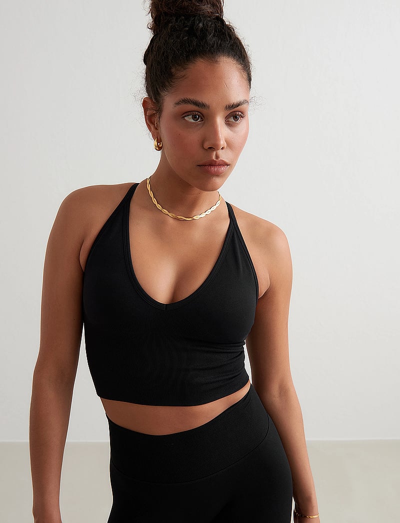 aim´n - Shape Seamless Cross Back Bralette - sports bras - black - 0