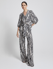 Andiata - Rochelle Print Trousers - vakarėlių drabužiai išparduotuvių kainomis - beige stripes - 2
