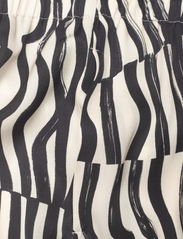 Andiata - Rochelle Print Trousers - juhlamuotia outlet-hintaan - beige stripes - 7