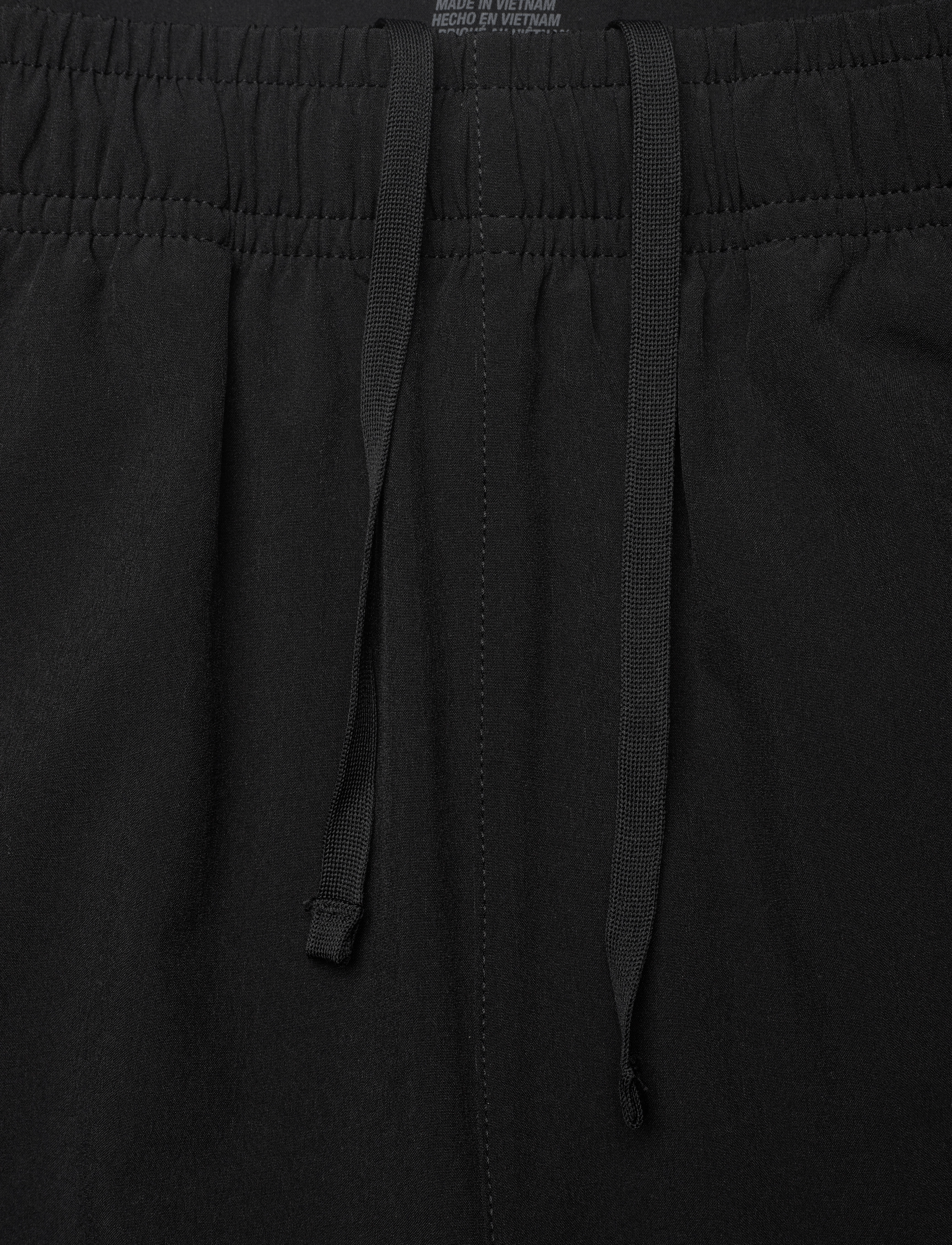 Asics - ASICS CORE WOVEN PANT - pantalons - performance black - 5