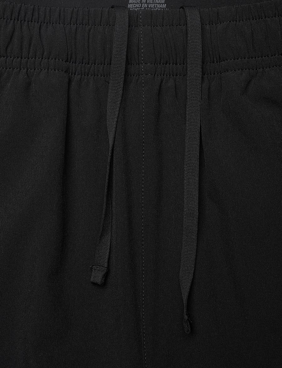 Asics - ASICS CORE WOVEN PANT - pantalons - performance black - 5