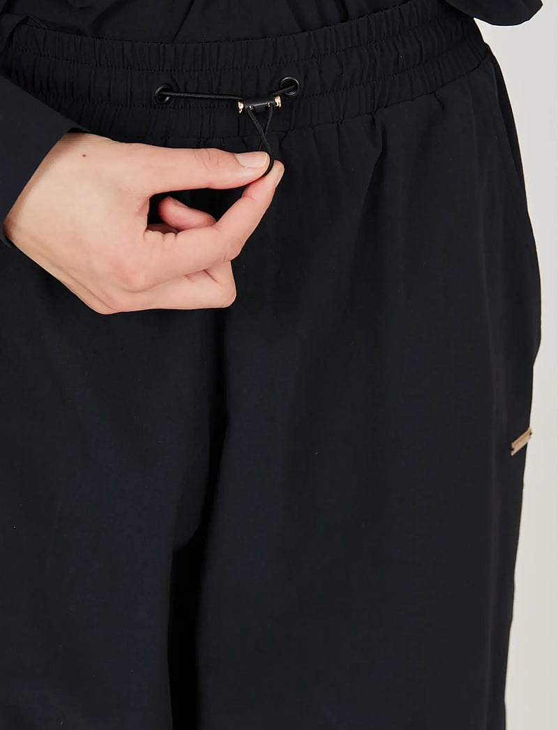 Athlecia - Hero W Track Pants - joggingbukser - black - 5