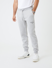 Björn Borg - BORG LOGO PANTS - verryttelyhousut - light grey melange - 4