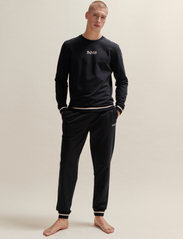 BOSS - Iconic Pants - collegehousut - black - 1