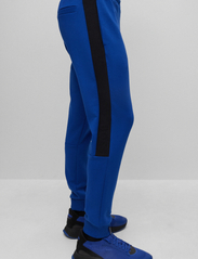 BOSS - Hadiko 1 - spodnie treningowe - bright blue - 6