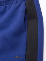 BOSS - Hadiko 1 - spodnie treningowe - bright blue - 7