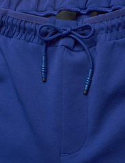 BOSS - Hadiko 1 - spodnie treningowe - bright blue - 8