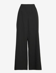 Boutique Moschino - Trousers - bukser med brede ben - black - 0