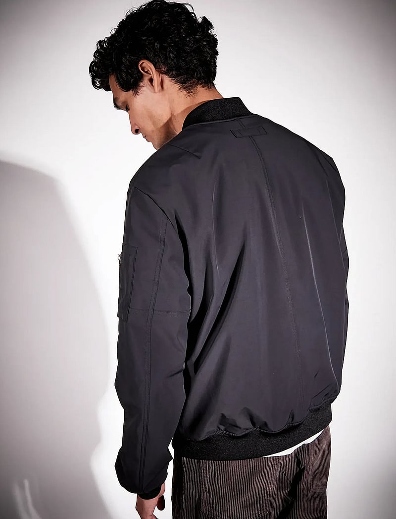 Brixtol Textiles - Harris Green Stone - lendurijakid - black - 2