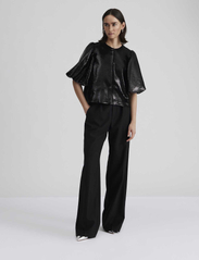 Malina - Cleo pouf sleeve blouse - kortärmade blusar - black sequin - 2