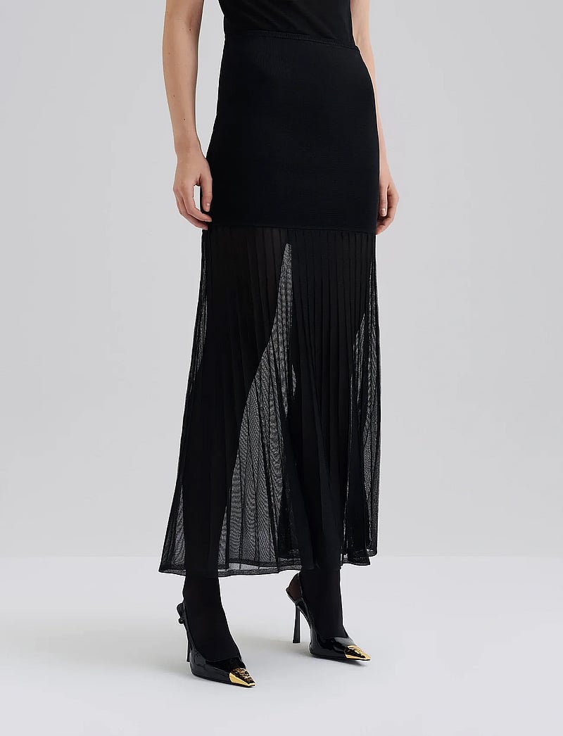 Malina - Calina Sheer Knitted Maxi skirt - plisserade kjolar - black - 0