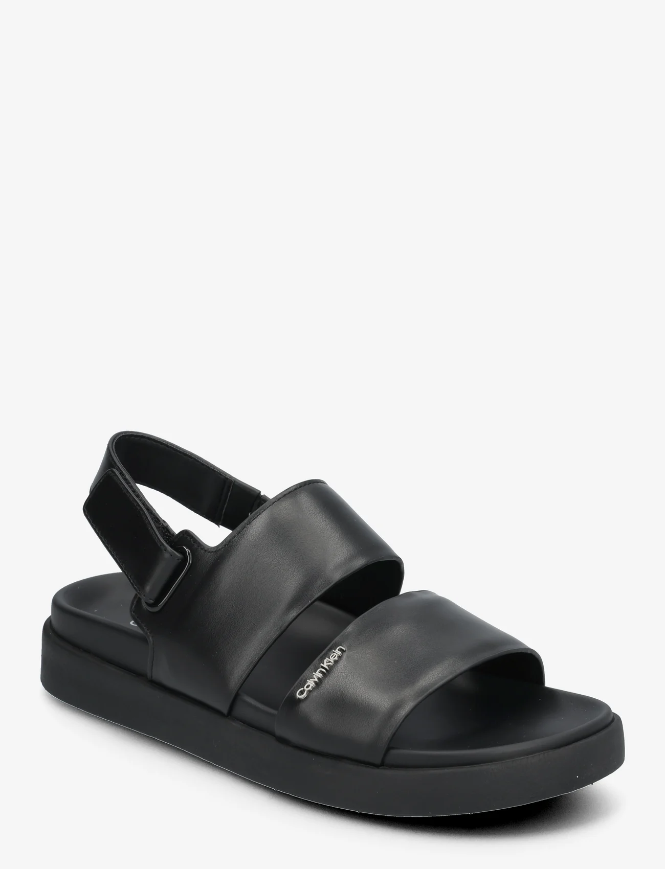 Calvin Klein - FLAT SANDAL CALVIN MTL LTH - zempapēžu sandales - black - 0