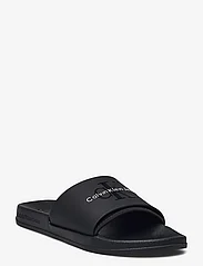 Calvin Klein - SLIDE MONOGRAM TPU - baseino šlepetės - black - 0