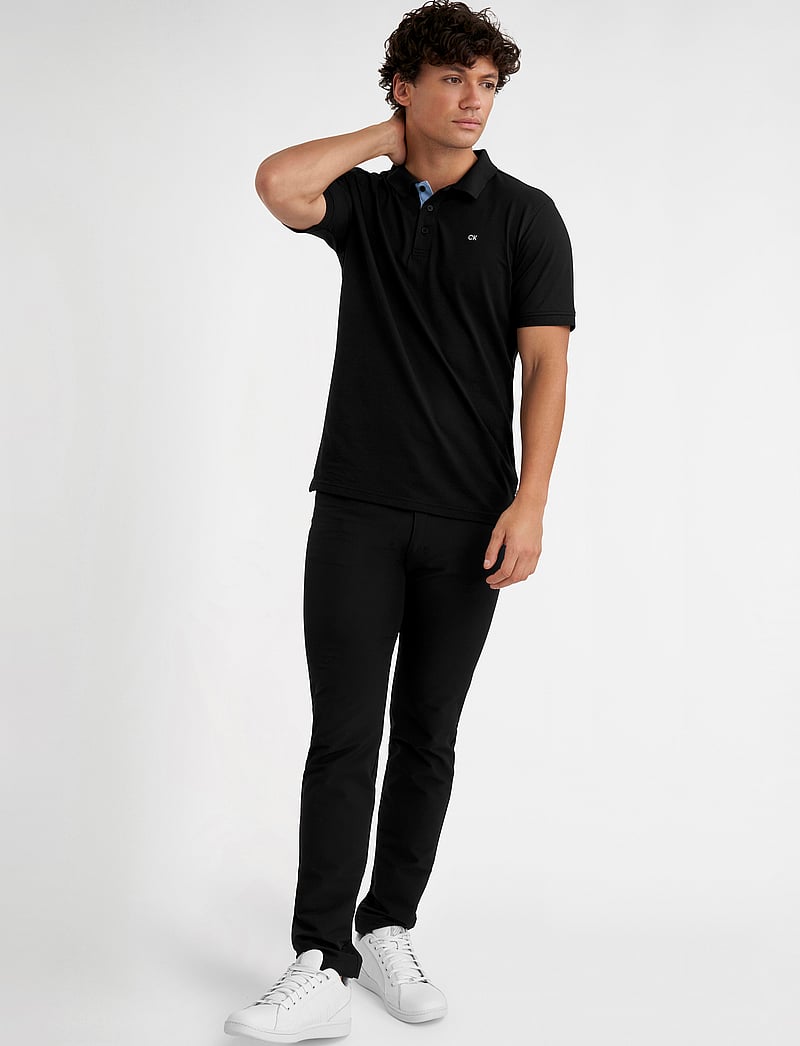 Calvin Klein Golf - QUAD POLO - toppar & t-shirts - black - 3