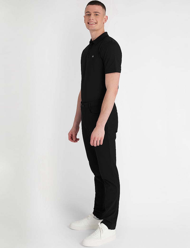 Calvin Klein Golf - PLANET POLO - toppar & t-shirts - black - 3