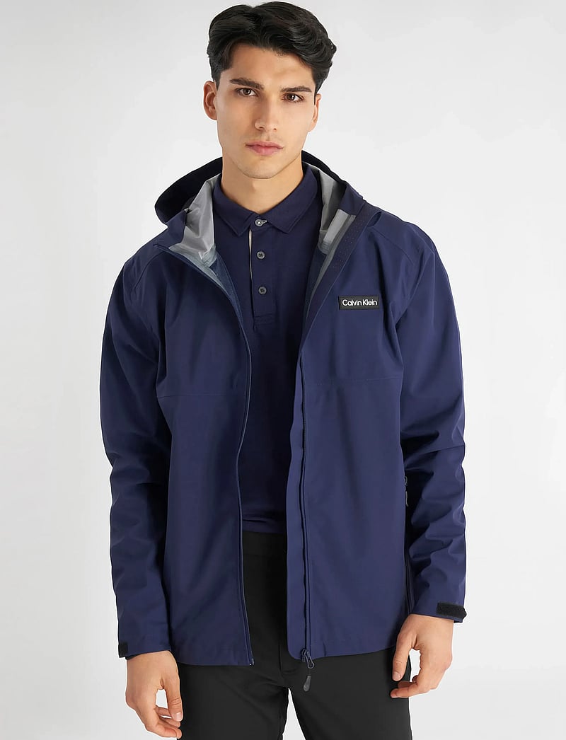 Calvin Klein Golf - FEATHER DRY 15K HOODED WATERPROOF JACKET - golfijakid - navy - 5
