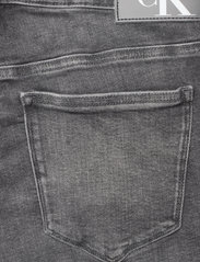 Calvin Klein Jeans - HIGH RISE SKINNY ANKLE PLUS - skinny jeans - denim grey - 4