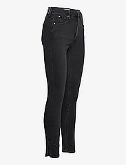 Calvin Klein Jeans - HIGH RISE SKINNY - pillifarkut - denim black - 3