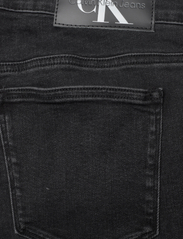 Calvin Klein Jeans - HIGH RISE SKINNY PLUS - džinsa bikses ar šaurām starām - denim black - 4