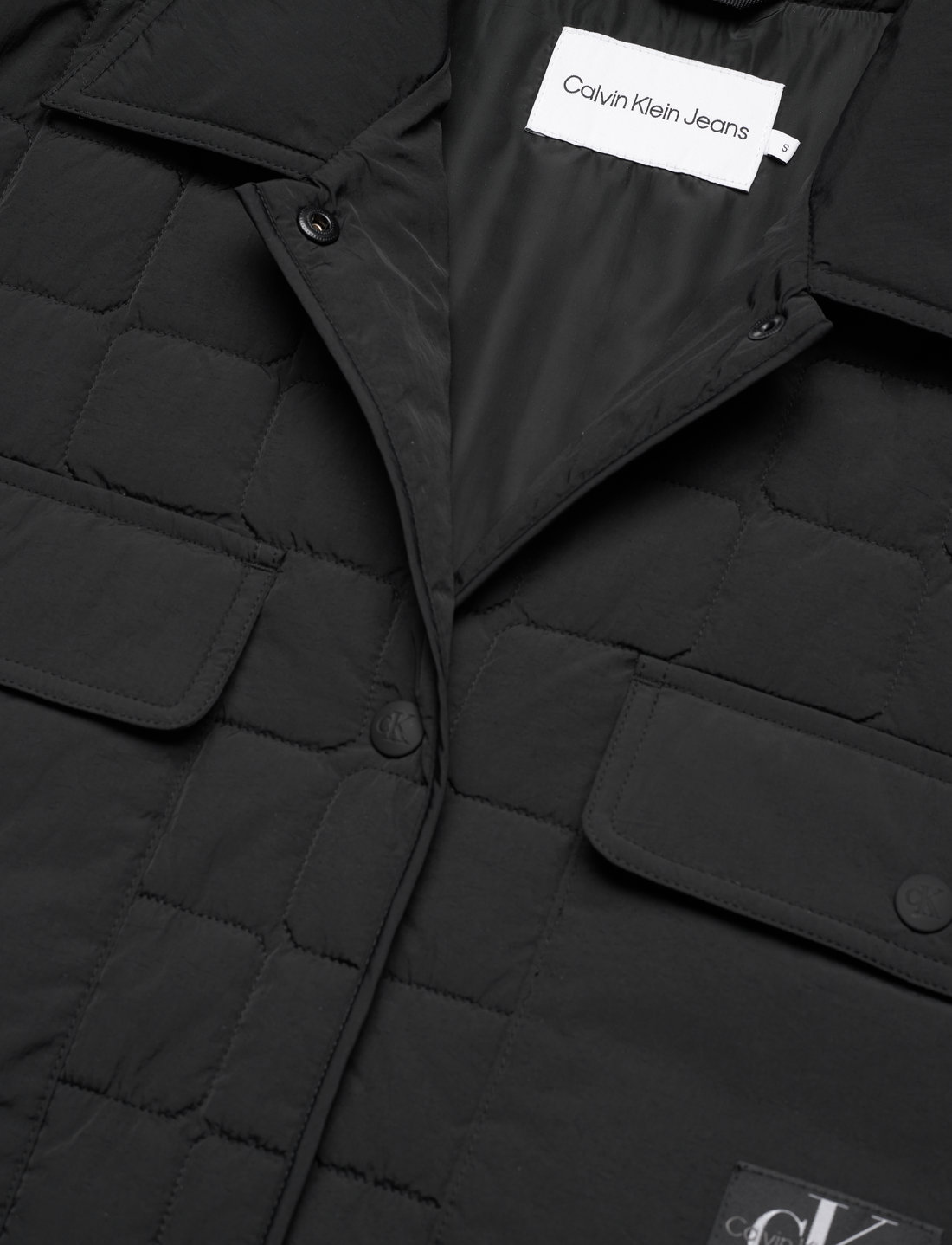 Calvin Klein Jeans Long Quilted Utility Coat - 124.95 €. Buy Quilted jackets  from Calvin Klein Jeans online at Boozt.com. Fast delivery and easy returns