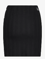 Calvin Klein Jeans - BADGE RIB ELONGATED SKIRT - short skirts - ck black - 1