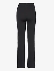 Calvin Klein Jeans - BADGE STRAIGHT KNITTED PANTS - jogginghosen - ck black - 1