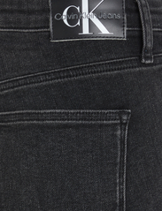 Calvin Klein Jeans - HIGH RISE SKINNY - džinsa bikses ar šaurām starām - denim black - 9