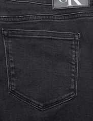 Calvin Klein Jeans - MID RISE SKINNY - siaurėjantys džinsai - denim black - 7