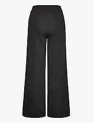 Calvin Klein Jeans - CK EMBRO BADGE KNIT PANT - hosen mit weitem bein - ck black - 1