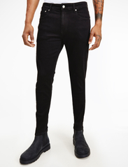Calvin Klein Jeans - SUPER SKINNY - skinny jeans - denim black - 0